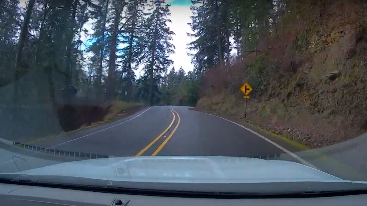 Dashcam Captures Distracted Driver Plunging 200 Feet Off Cliff